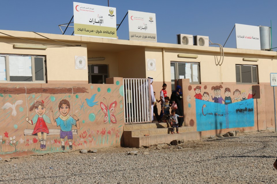 Nizir, (not pictured) is a fifty-year-old woman who is now living in the courtyard of the camp’s school (pictured)