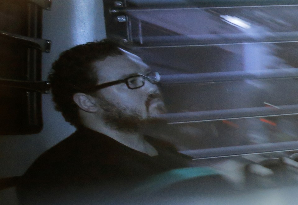 Jutting arrives at court in a police van
