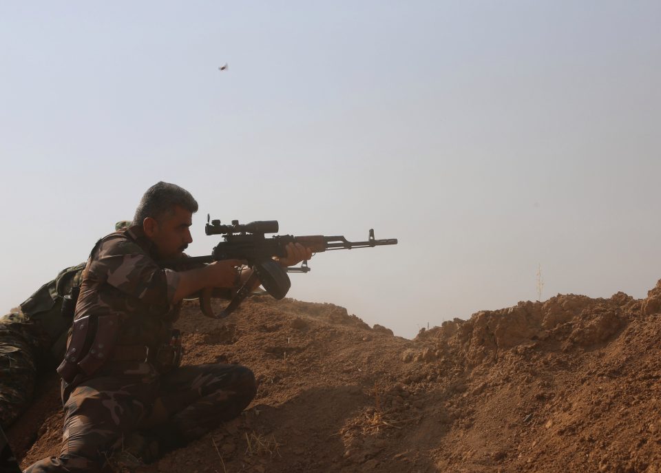 The Sniper of Mosul is thought to have been behind shootings in four different districts of the city (Pictured: A Peshmarga fighter in Bashiqa)