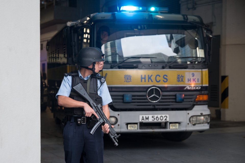 A Hong Kong Correctional Services van carrying Rurik Jutting leaves court