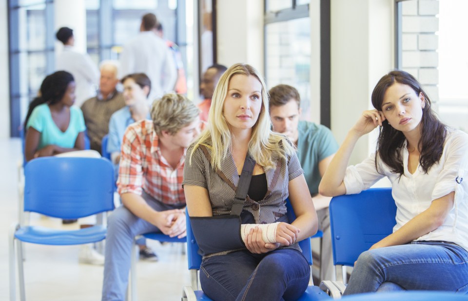 Woman sitting in hospital waiting area