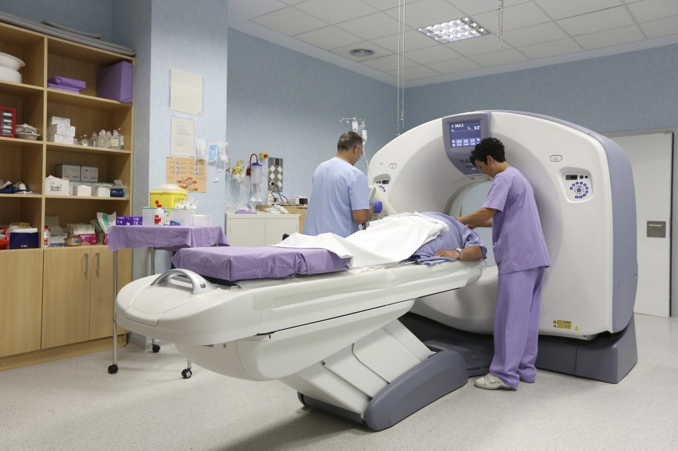 A patient having a CAT scan in hospital