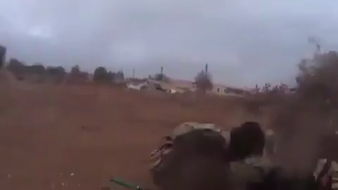 The terrorist is fighting alongside another jihadi