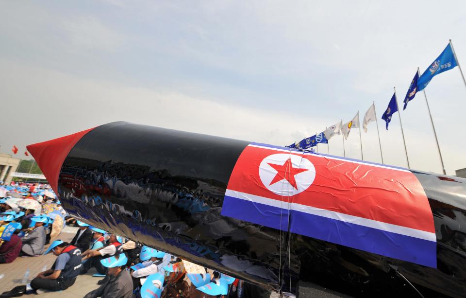 A mock North Korean missile is pictured