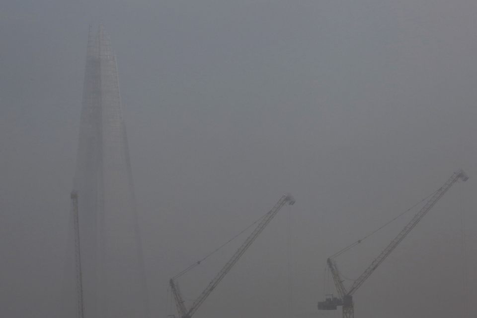 Fog surrounds the Shard building in London
