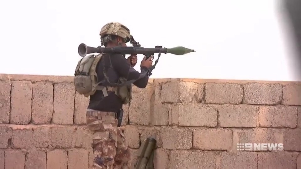 One Iraqi soldier is filmed firing a rocket-propelled grenade at approaching ISIS forces on the outskirts of Mosul