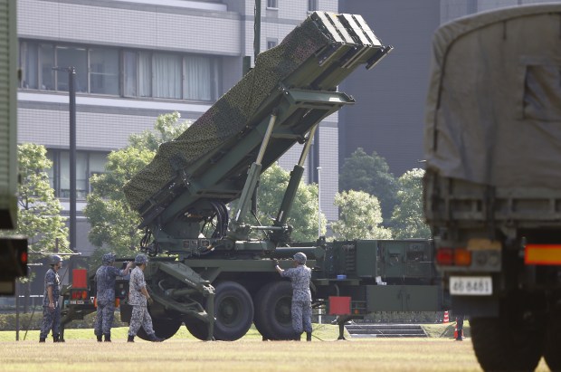 Japan Self-Defence Force members set up a PAC-3 Patriot missile unit deployed in Tokyo,