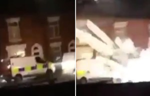 Shocking moment fireworks explode under police vans after thugs shoot rockets at them