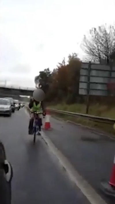 Initially he pulls over as Wayne and his friend let him past, but then rejoins the main road