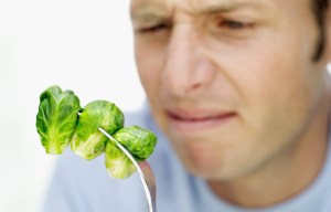 Your hatred of sprouts is all in your head! Brain 'ignores low-calorie food to ensure survival'