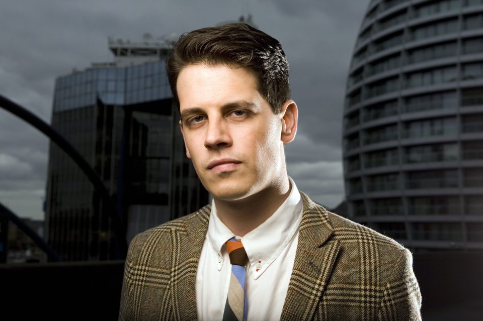 Milo Yiannopoulos has branded Theresa May a "total fascist" after he was banned from speaking at his old school