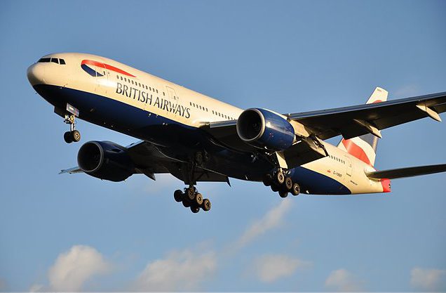 G-YMMR British Airways Boeing 777-236(ER) - cn 36516 / 771 landing at London Heathrow Airport with glow from setting sun