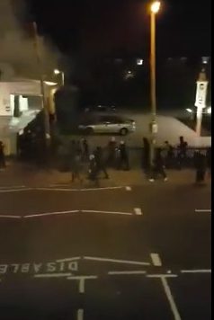 A gang of Halloween trick or treaters set off a firework beside a PETROL station