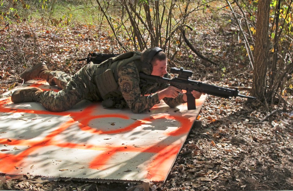 A member of the III% Security Force militia conducts shooting practice during a field training exercise in Jackson, Georgia
