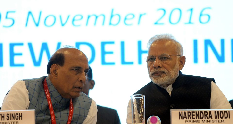 Indian Prime Minister Narendra Modi (R) and Indian Home Minster Rajnath Singh (L) attend the Asian Ministerial Conference