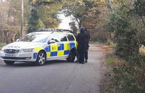 Man in custody after two men are injured in shooting in leafy Kent village
