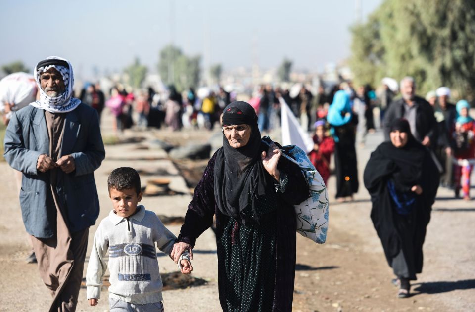 The long walk to freedom .. families leave their homes in Gogjali ready to get taken to camps