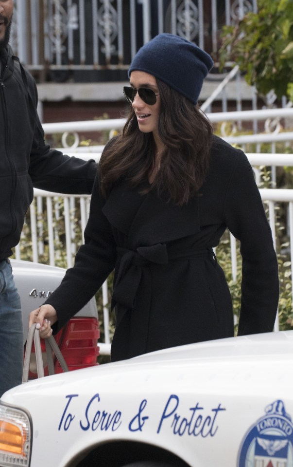 Prince Harry's new girlfriend Meghan Markle leaves her home in Toronto Canada on her way to the film set.
