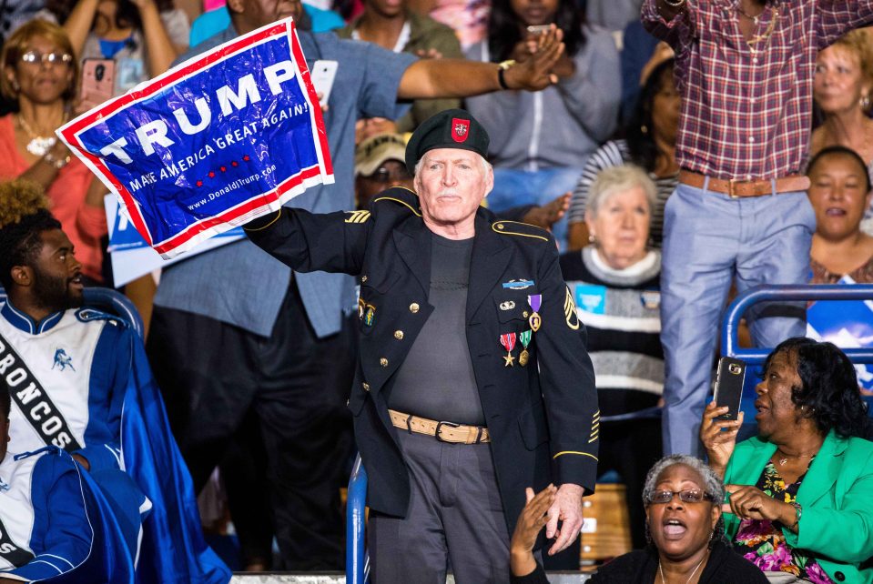 A Donald Trump supporter interrupts President Obama’s speech at Fayetteville State University