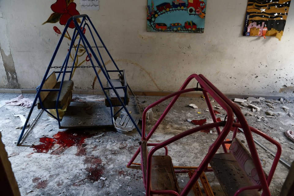 Blood-stained plying equipment lies in the ruined nursery after the shocking attack