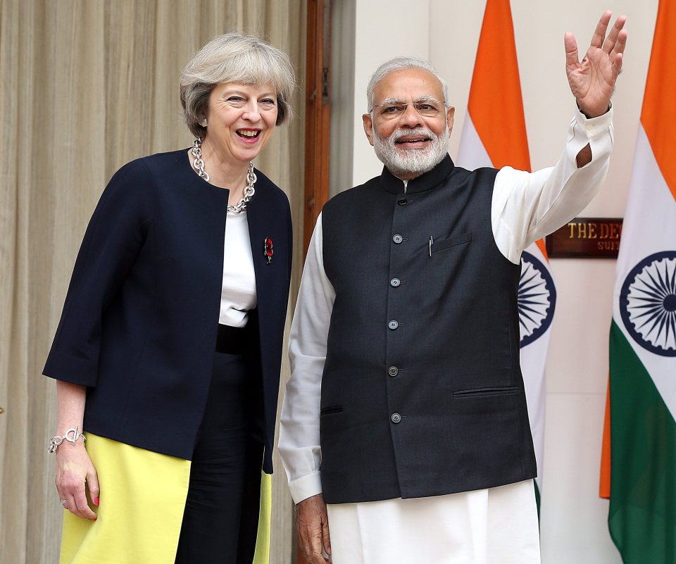 Theresa May and Narendra Modi