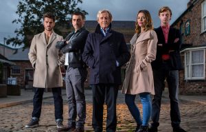 Corrie's Barlow family reunited as Ken's missing son Daniel and hunky grandson Adam return
