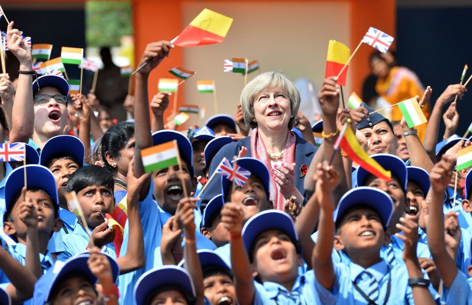 The Prime Minister stood amidst children as they watch a fly past by Indian Air Force aircraft this morning