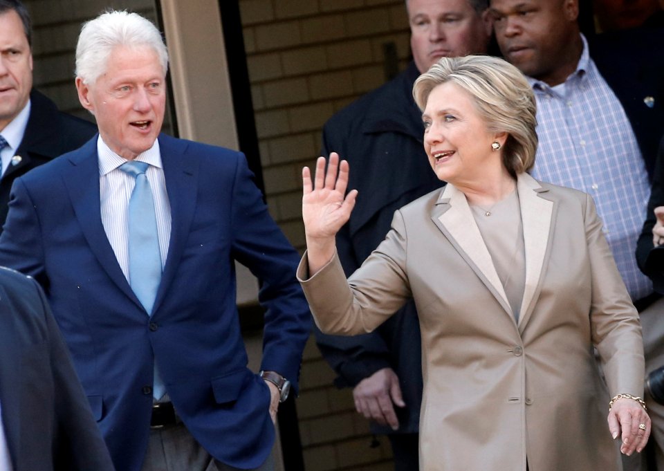 Hillary and Bill Clinton after casting their votes yesterday
