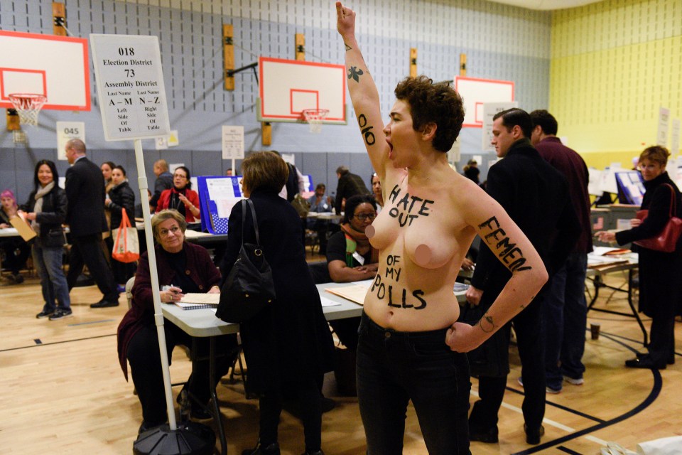 The woman staged the protest for about 30 seconds before being apprehended