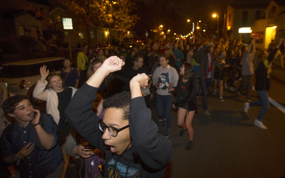 Protesters against President-elect Donald Trump march down a street east of the University of Oregon campus in Eugene, Ore., Wednesday, Nov. 9, 2016. (Chris Pietsch/The Register-Guard via AP)
