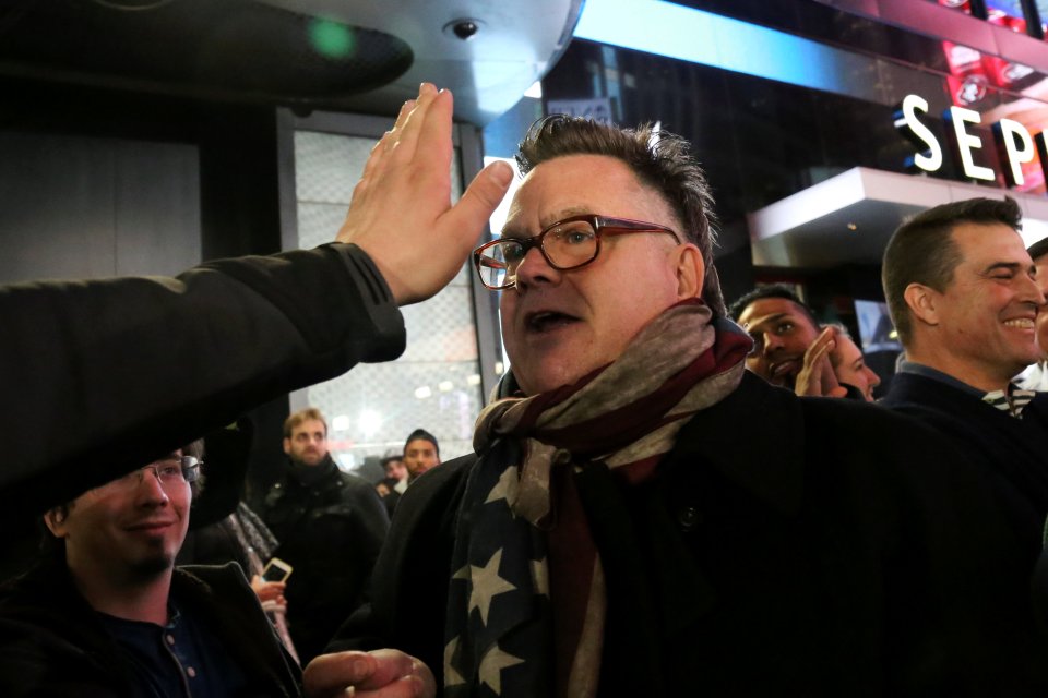 Pro-Trump supporters and opponents of the Republican clash in Times Square, New York
