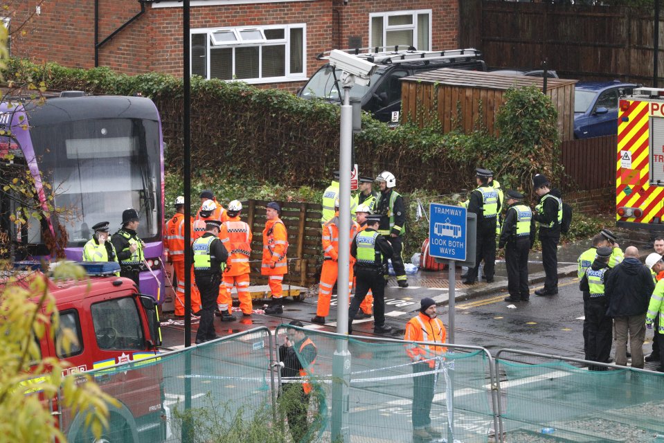 The tram derailed at 6am as heavy rain hit London