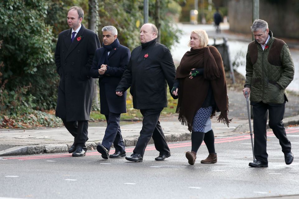 Mayor of London Sadiq Khan (2L) arrives