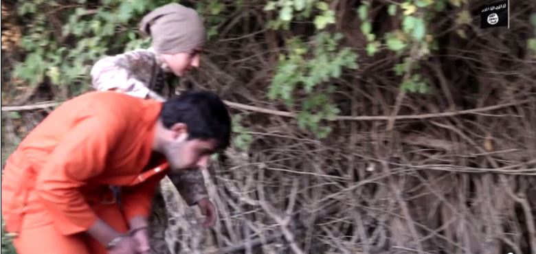 A cub drags a prisoner to his execution spot