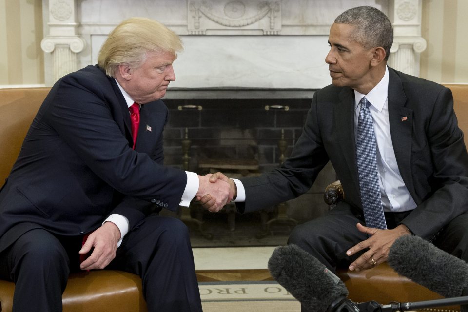 President Barack Obama (R) shakes hands with President-elect Donald Trump (L) at the end of their meeting in the Oval Office of the White House