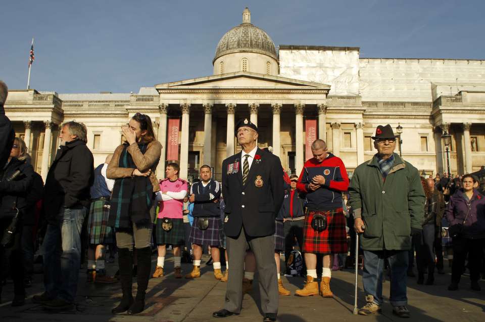 People attend an Armistice Day event at Trafalgar Square in London
