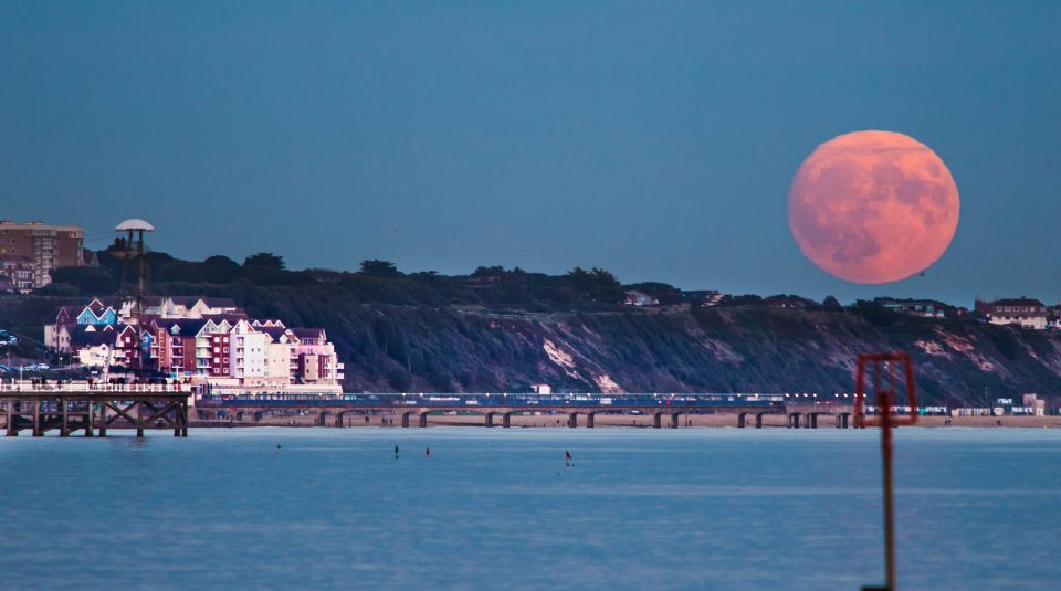 Photographer Kevin Ferrioli captured the supermoon rising over Boscombe beach from Branksome beach, Dorset