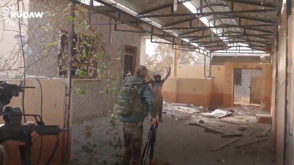 The ISIS fanatic comes out with his hands up