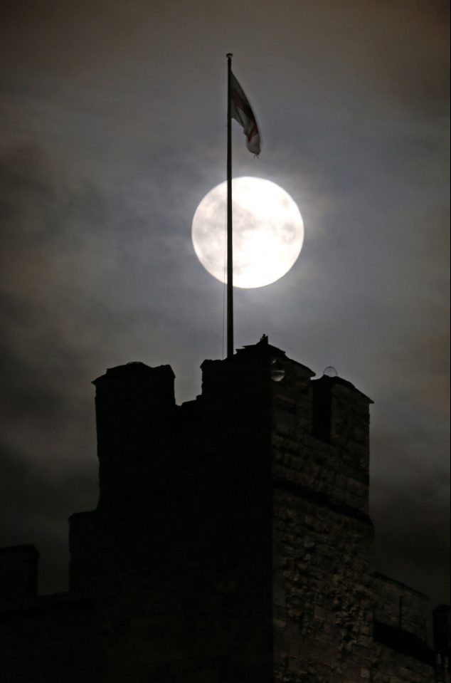 A Supermoon over Bamburgh castle in Northumberland