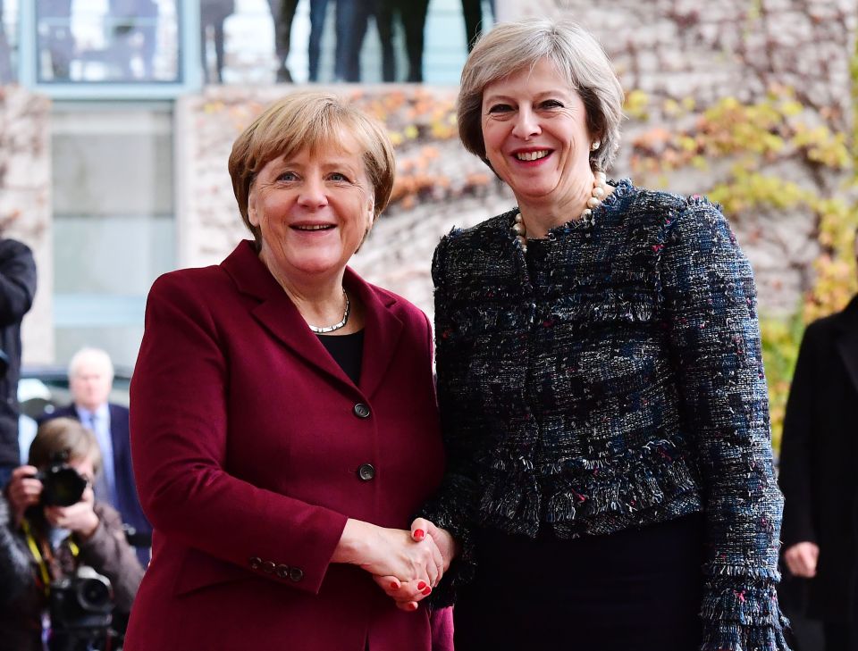 German Chancellor Angela Merkel greets B