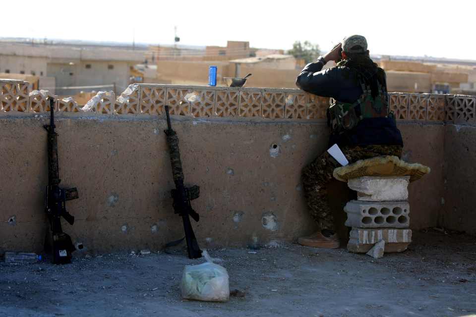 A commander from the Kurdish-Arab alliance
