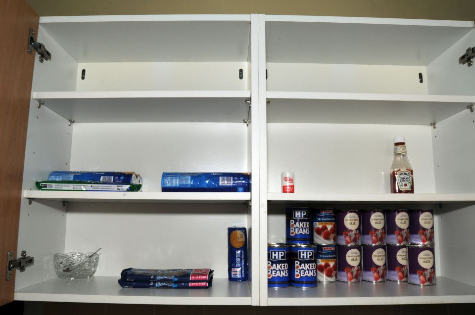 West Yorkshire Police handout photo of the inside of a kitchen cupboard in the home of Thomas Mair which was shown to jury at the Old Bailey