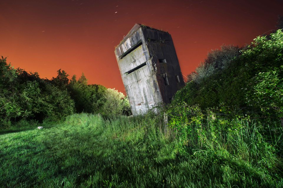 A photographer has captured a series of eerie images showing Hitler's European defence system