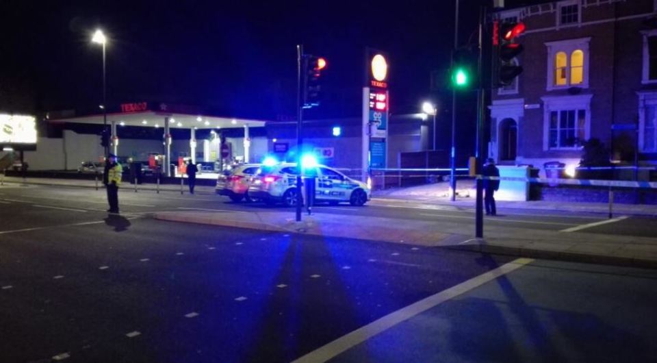 Bow Road in East London is sealed off after a plain clothes cop was stabbed near the Bow Bells pub