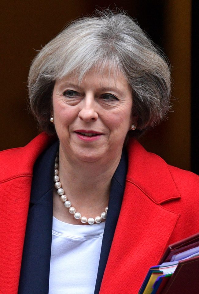 Drawing the line ... Theresa May has pledged more British troops to defend Eastern Europe against Russia