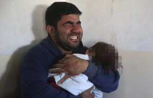 Harrowing picture captures father's overwhelming anguish after daughter is killed in ISIS mortar attack