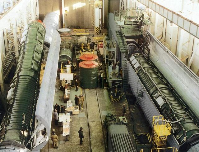 The loading of an RS-22 missile in rail-mobile launcher
