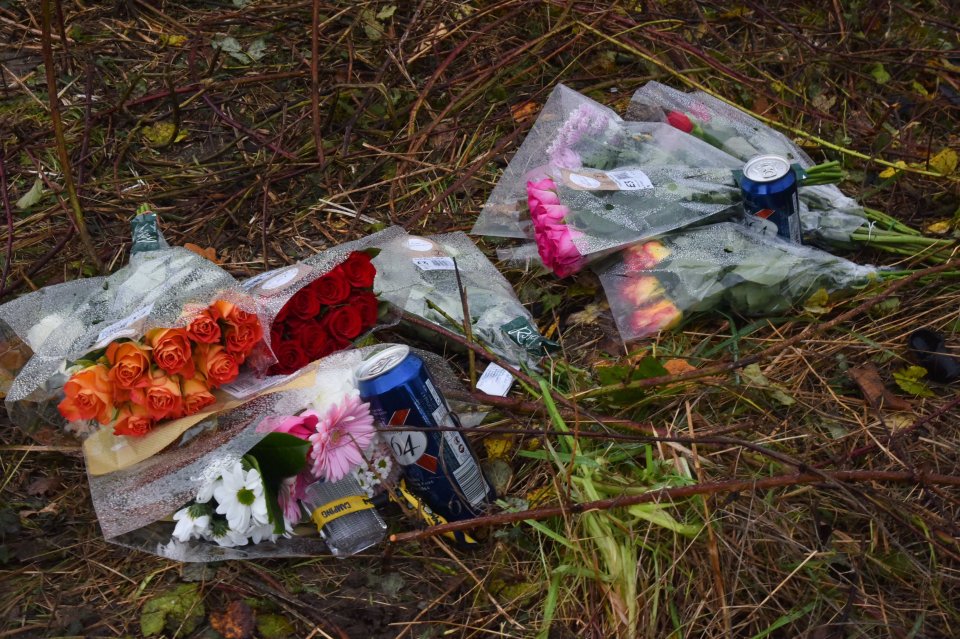 Flowers, cards and cans of beer were left for the tragic brothers 