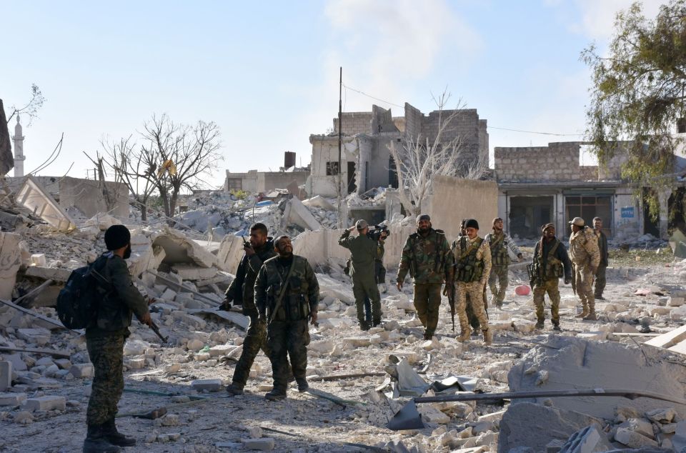 Syrian pro-government forces take over bombed out areas of Aleppo