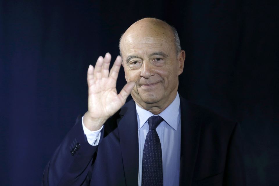 Alain Juppe, current mayor of Bordeaux and member of the conservative Les Republicains political party, reacts after he delivered his speech to recognise his defeat in the second round for the French center-right presidential primary election in Pari